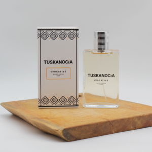 Tuskanocia Natural Perfume Spray on a Wooden Board